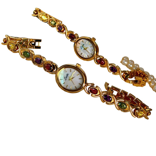 Damenarmbanduhr mit ovalem Zifferblatt und Edelsteinakzenten